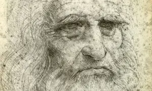 Szkic przedstawia zmęczoną twarz, prawdopodobnie autoportret Leonardo da Vinci, z charakterystyczną brodą i zmarszczkami.