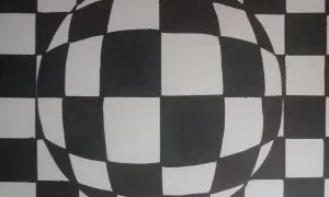 Czarno-biała kula z szachownicą, tworząca iluzję optyczną. Proste, ale efektowne op art łatwe do wykonania.