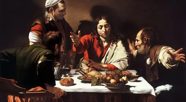 Wieczerza w Emaus Caravaggia: Jezus błogosławi posiłek, rozpoznany przez uczniów. Dramatyczne światło i gesty.