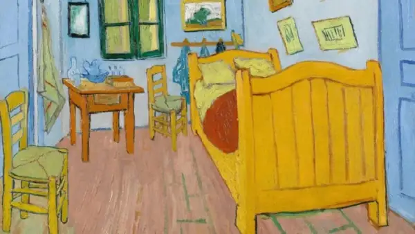 Sypialnia Van Gogha, pełna żółci i błękitu, z charakterystycznymi dla jego stylu rysunkami na ścianach.